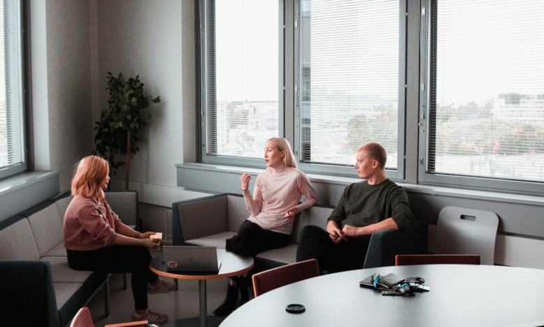 Team members engaged in a discussion about "What is AI orchestration?" and its impact on the role of AI orchestration in modern workflows