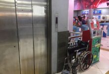 An elevator under maintenance in a station
