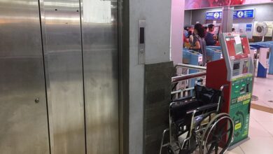An elevator under maintenance in a station
