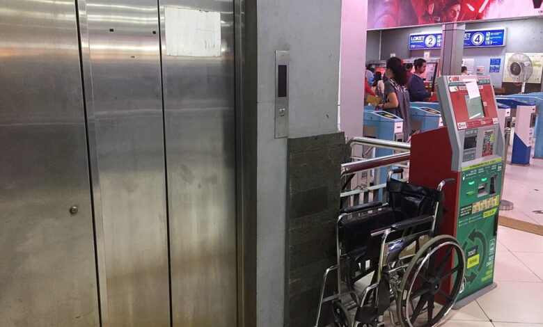 An elevator under maintenance in a station